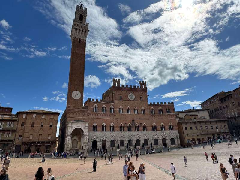 Sienna - Just sit in the Piazza del Campo - not necessarily in a restaurant, many simply grab and panini and sit in the centre of the square soaking it all in.