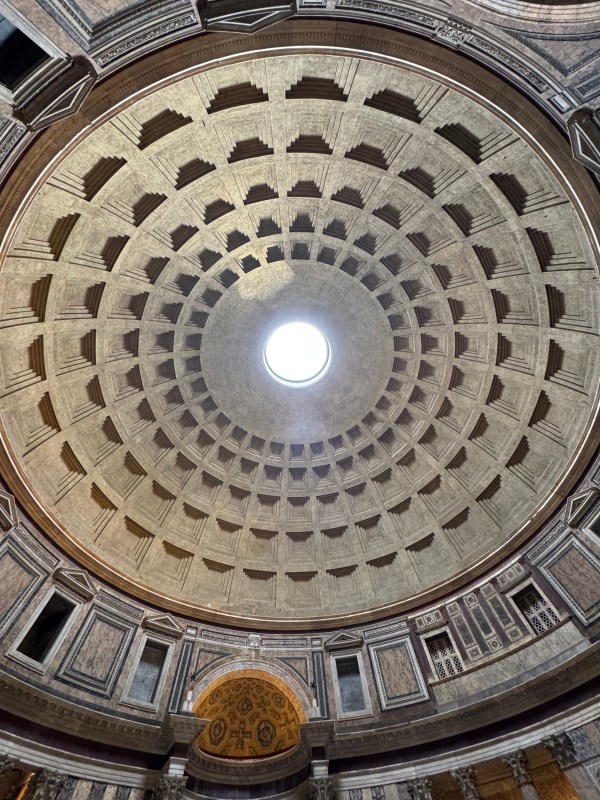The roof of The Pantheon, with its hole that allows the weather to come in . . . and the key engineering feat that allowed this wonder to stand for nearly 2000 years, Rome